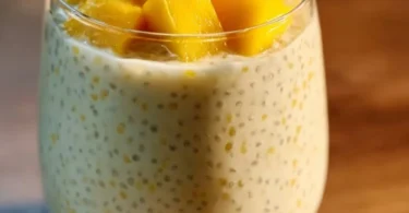 Delicious creamy mango sago dessert with fresh mango chunks and sago pearls.