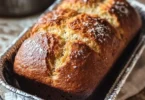 Freshly baked homemade church loaves on a wooden table