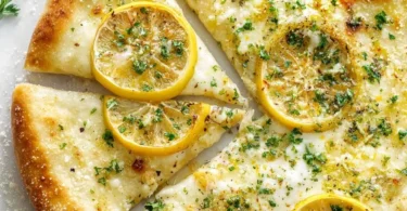Delicious Lemon Pizza topped with fresh ingredients and a zesty citrus flavor
