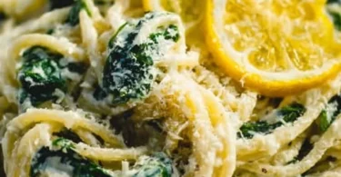 A bowl of Lemon Ricotta Pasta with fresh spinach and lemon zest
