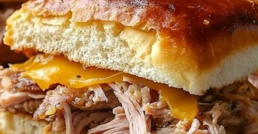 Mouthwatering Slow Cooker Cuban Sandwiches with pulled pork and cheese