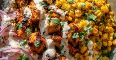 Colorful and vibrant rice bowl filled with fresh vegetables and toppings