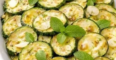 Zucchini marinated in vinegar served in a fresh salad