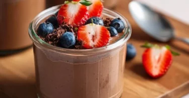 Delicious chocolate protein pudding in a bowl, perfect for a healthy dessert.