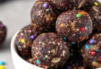 Deliciously rich Cosmic Brownie Bites with colorful sprinkles.