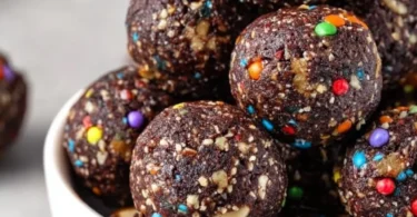 Deliciously rich Cosmic Brownie Bites with colorful sprinkles.