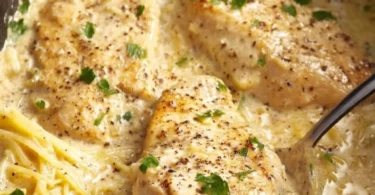 Crock Pot Angel Chicken dish served with a side of vegetables