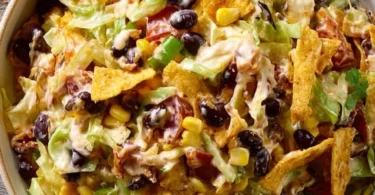 Delicious Frito Cowboy Cabbage dish prepared with toppings and served in a bowl