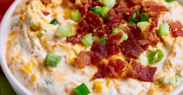 High protein crack dip served with fresh veggies and crackers