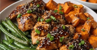 Delicious plate of Honey Garlic Chicken served with roasted sweet potato