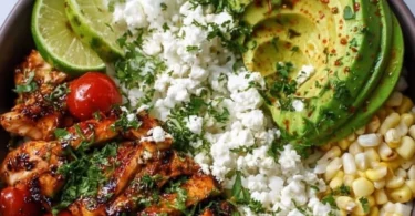 Honey Lime Chicken served with avocado rice in a colorful bowl