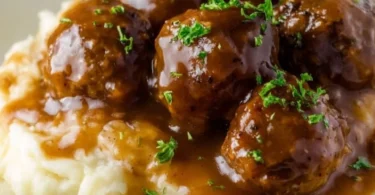Delicious slow cooker Salisbury steak meatballs served on a plate