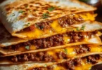 Plate of Smashburger Quesadillas, filled with melted cheese and savory ingredients